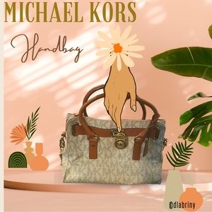 Medium sized Michael Kors Purse with MK logo design. Cream/ off white and brown